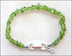 A handmade peridot anklet/bracelet, sterling silver clasp, Chi (Qi) jewelry for health. Healing jewelry, promote Qi (Chi) flow, for energy detox, pain reduction for repetitive strain (stress) injury, speeding up wound healing.